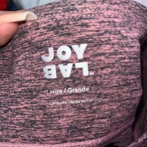 Pink and black leggings with pockets on the side